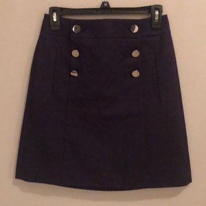 Mid length work skirt with silver buttons